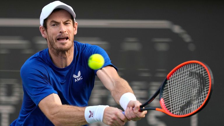 Andy Murray of Great Britain returns the ball to Denis Shapovalov of Canada during a match of the Dubai Duty Free Tennis Championships in Dubai, United Arab Emirates, Monday, Feb. 26, 2024. (AP Photo/Kamran Jebreili)