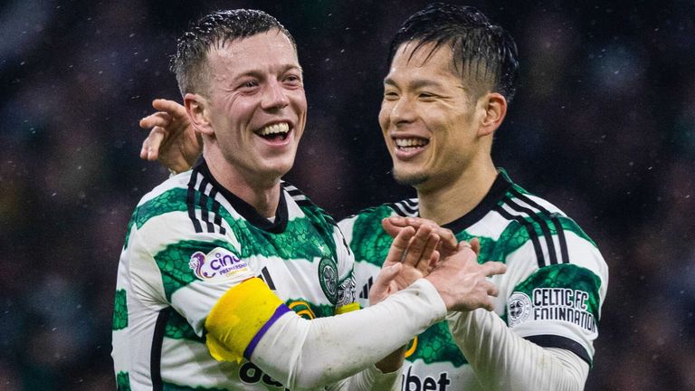 Celtic's Callum McGregor celebrates after scoring to make it 6-0 with Tomoki Iwata during a cinch Premiership match between Celtic and Dundee