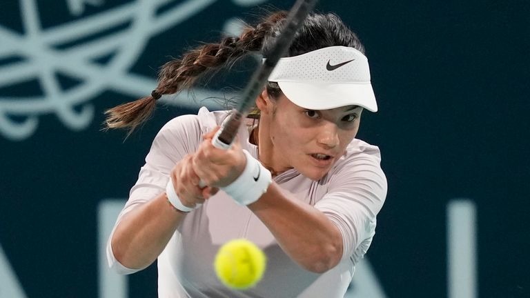 Emma Raducanu from Britain returns the ball to Marie Bouzkova of Czech Republic during a match of the Mubadala Abu Dhabi Open tennis tournament, in Abu Dhabi, United Arab Emirates, Monday, Feb. 5, 2024. (AP Photo/Kamran Jebreili)