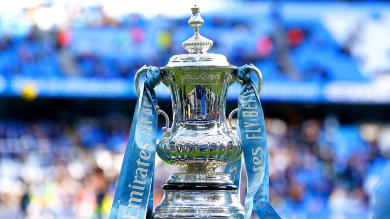 The FA Cup trophy on display ahead of the Emirates FA Cup Third Round match at the Etihad Stadium, Manchester. Picture date: Sunday January 7, 2024.