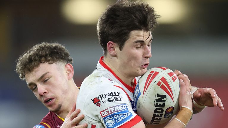 St Helens' Jon Bennison and Huddersfield Giants' Elliot Wallis in action (SWpix)