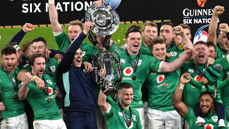 18 March 2023; Ireland players celebrate with the Six Nations trophy and Triple Crown trophy after the Guinness Six Nations Rugby Championship match between Ireland and England at Aviva Stadium in Dublin. Photo by Ramsey Cardy/Sportsfile