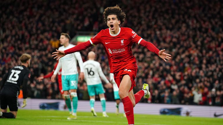 Jayden Danns celebrates his first goal for Liverpool in front of the Kop