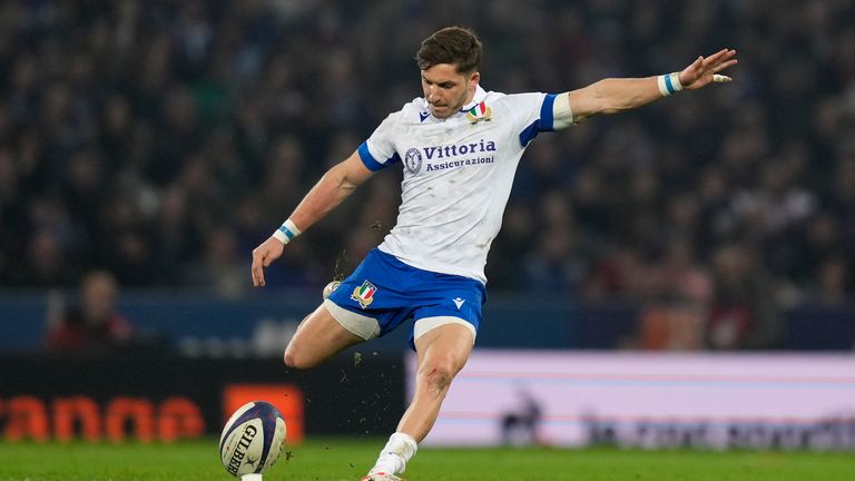 Italy's Martin Page-Relo kicks a penalty (AP Photo/Lewis Joly)