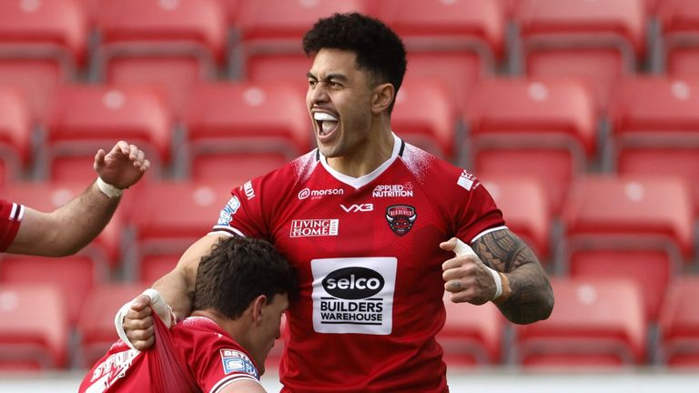Salford Red Devils' Sam Stone (second right) celebrates their side's first try of the game during the Betfred Super League match at the Salford Community Stadium, Salford. Picture date: Sunday February 25, 2024.